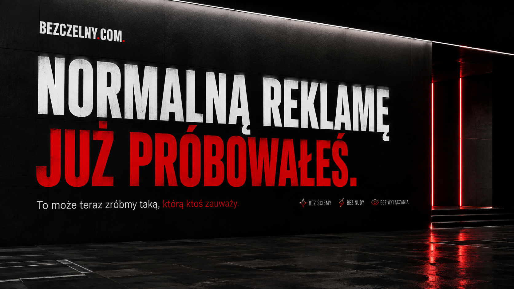 Czarna ściana z napisem: Normalną reklamę już próbowałeś. To może teraz zróbmy taką, którą ktoś zauważy.